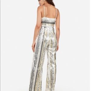Express Sequin Jumpsuit size large. NWT